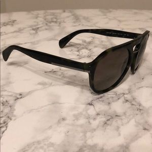 Green tortoise Prada sunglasses